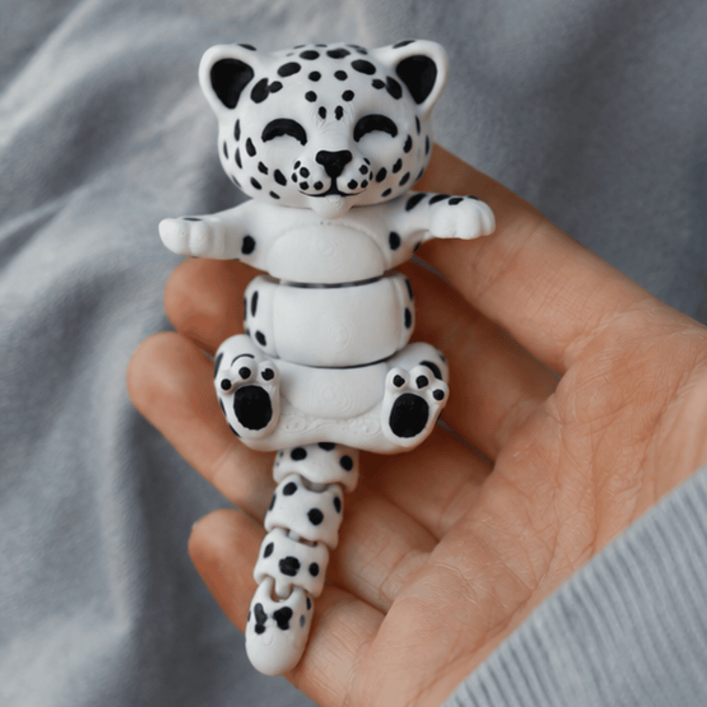 Shan Snap — Articulated Flexi Snow Leopard Keychain, Magnetic Paws